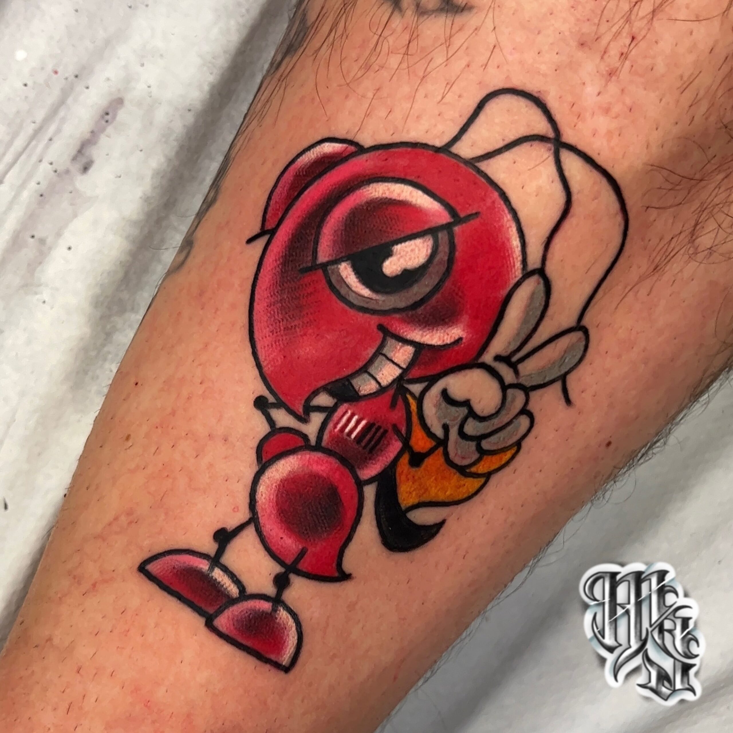 hormiga de marc marquez, piloto de motociclismo, realizado a todo color en estudio de madrid de tatuajes