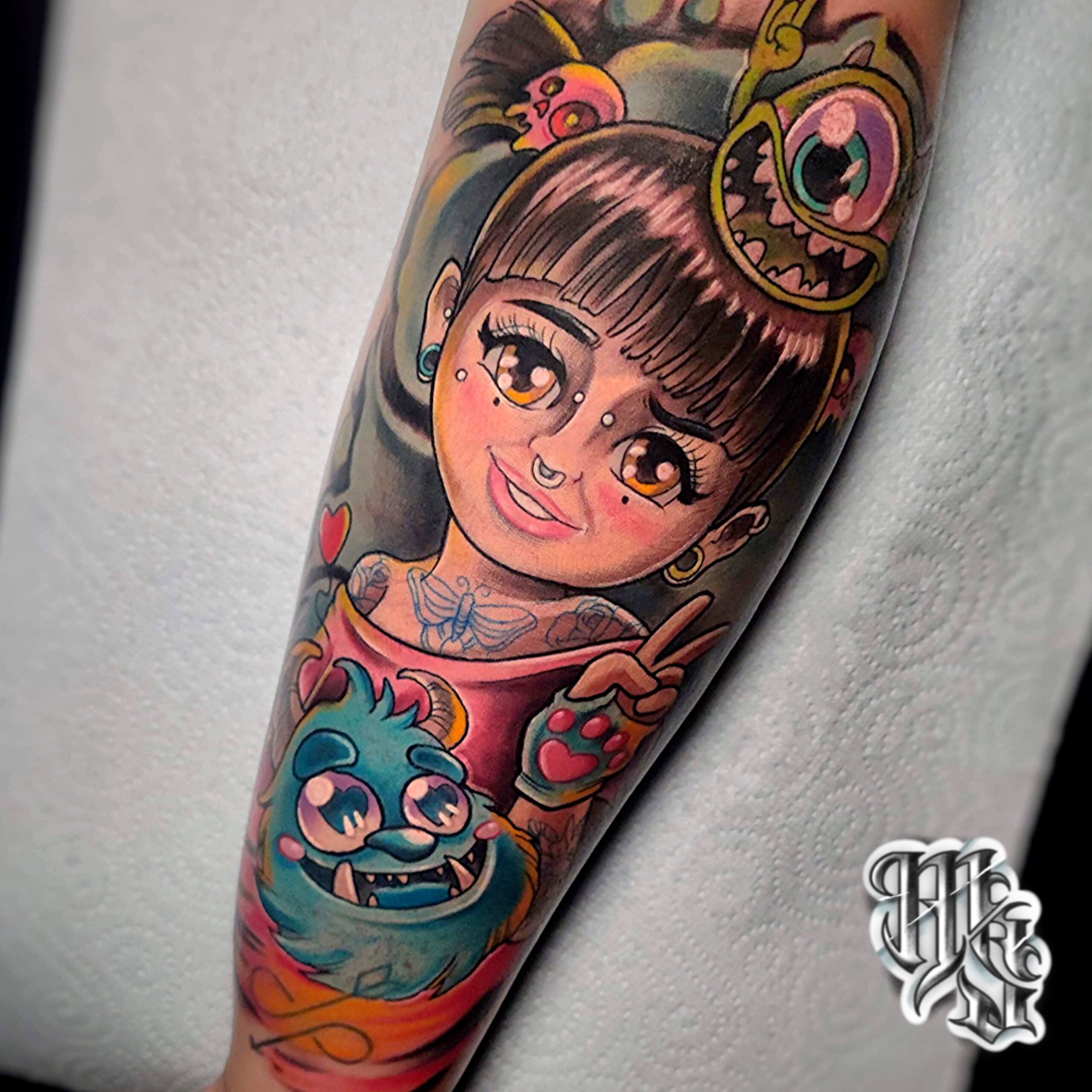 Disney pixar, tatuaje de monstruos s.a con la idea de la clienta de que boo fuera mas mayor, realizado a todo color por miguel sierra tatuajes en madrid, aluche, mostoles, vallecas